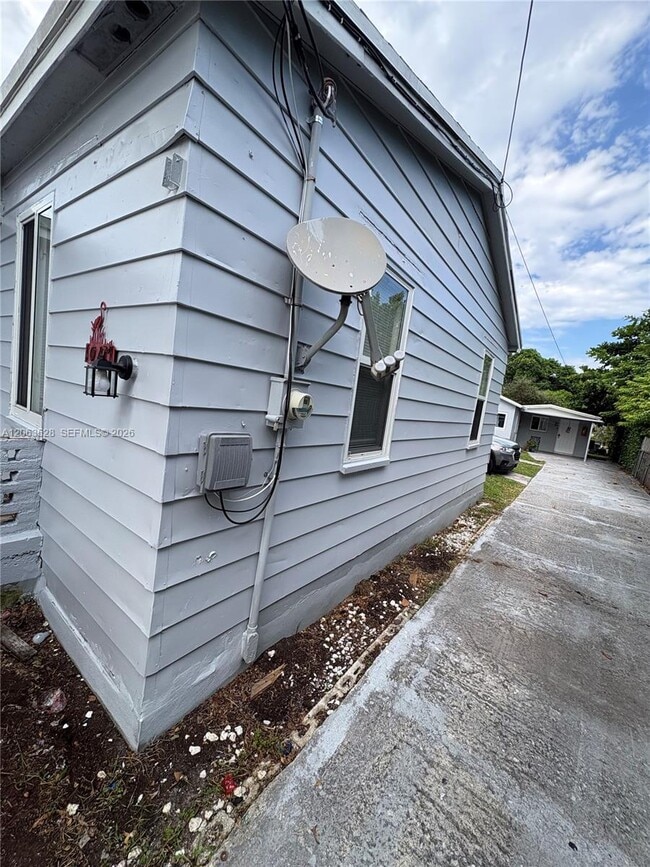 Photo - 10417 NW 6th Ave Unit Front