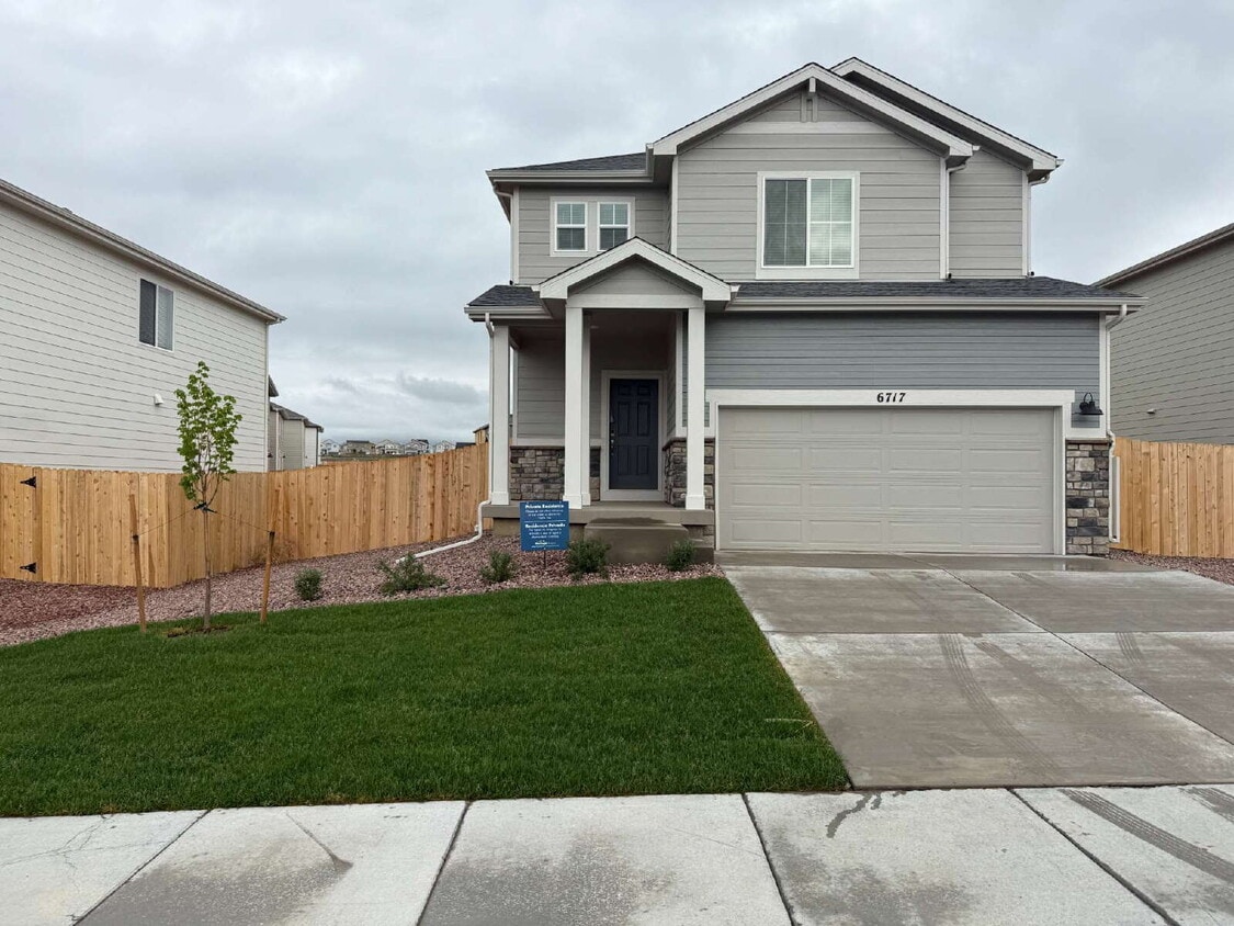 Photo - "Charming 3-Bed Sanctuary with 2.5 Baths at 6717 Wiper Way, Colorado Springs!"