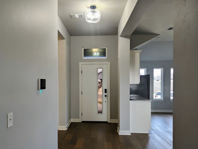 Photo - Spacious Yukon Home with Storm Shelter, 2-Car Garage & Fenced Yard!