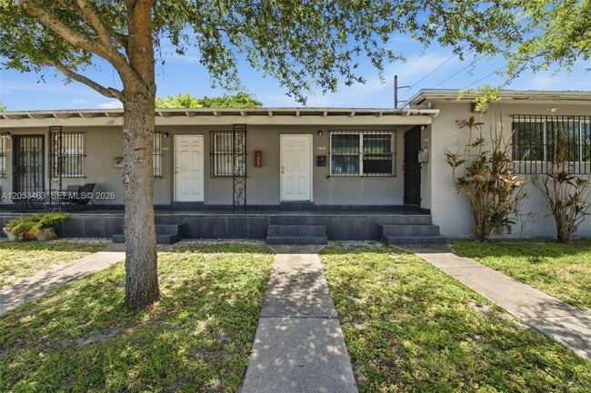 Building Photo - 7410 NW Miami Pl Unit 7414