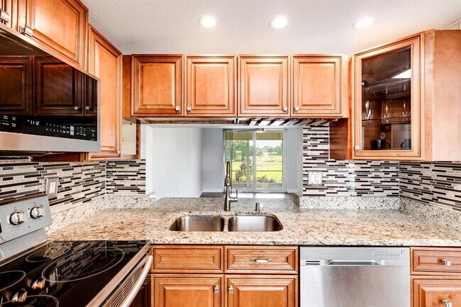 Photo - 9080 Lime Bay Blvd Unit 109