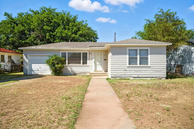 Building Photo - Fresh Paint, New Floors, and a Fresh Start! Rental
