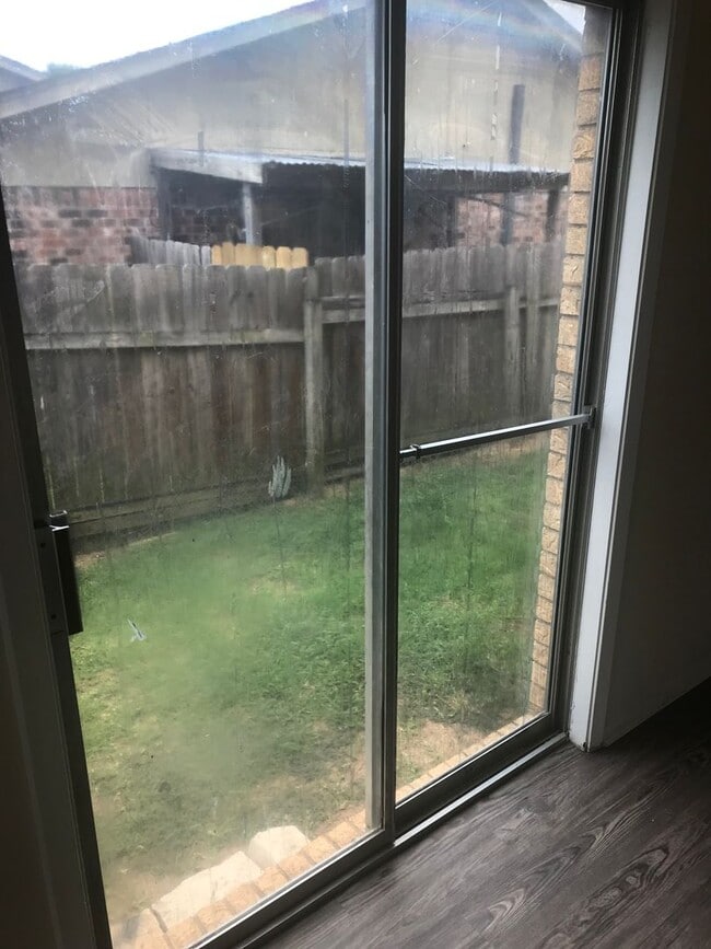 Photo - TWO BEDROOM DUPLEX WITH FENCED BACK YARD AVAILABLE 7/27/2026.