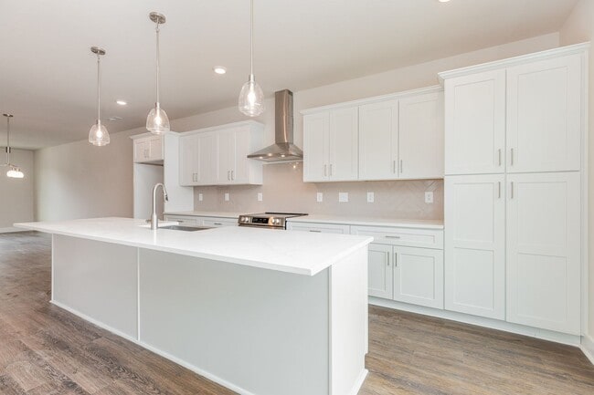 Photo - Beautiful 3BR 2.5BA Townhome w/ Full Appliance Kitchen • Garage Parking • Ultra-Modern