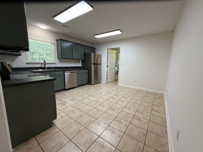 Photo - "Discover Comfort and Charm: Spacious 3-Bed, 2-Bath Home in Huntsville's Desirable Locale!"