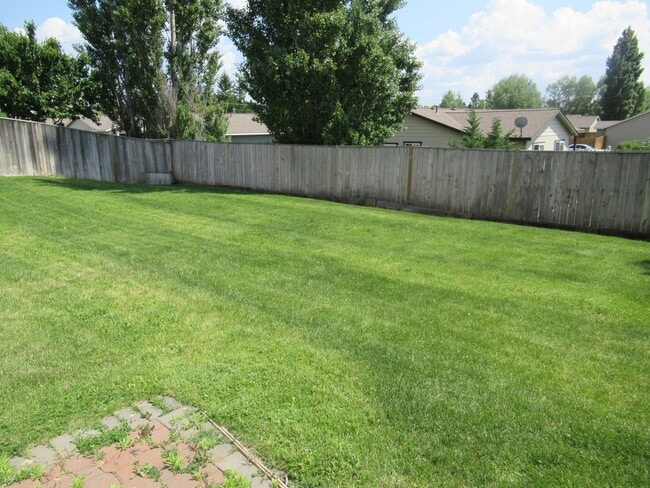 Photo - Spacious 3 Bedroom with Office - Fenced Lawn with Lawn Care Provided!