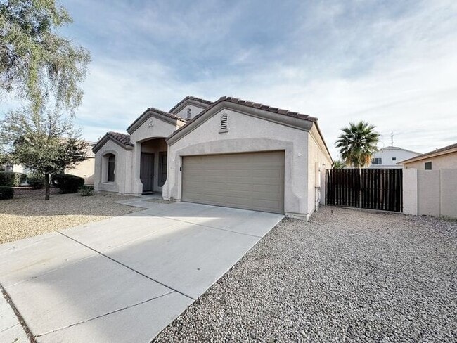 Photo - Single-level 4 bed, 2 bath home with tandem 3-car garage and RV gate.