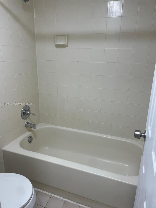 Photo - 1075 W 68th St Unit 304