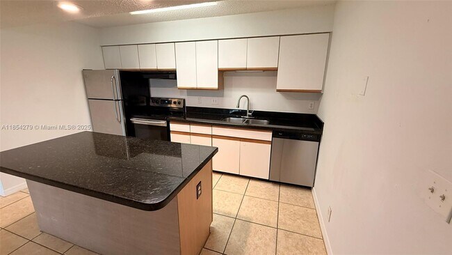 Building Photo - 4055 W McNab Rd Unit H201 Rental