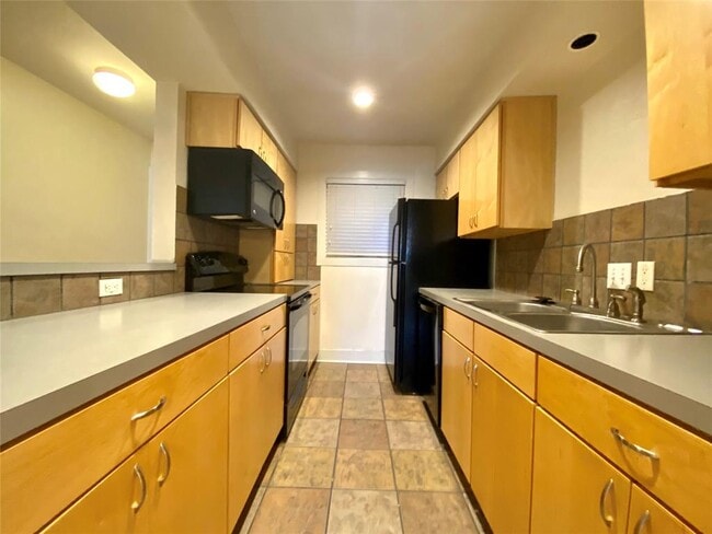 Building Photo - 3815 Guadalupe St Unit 207