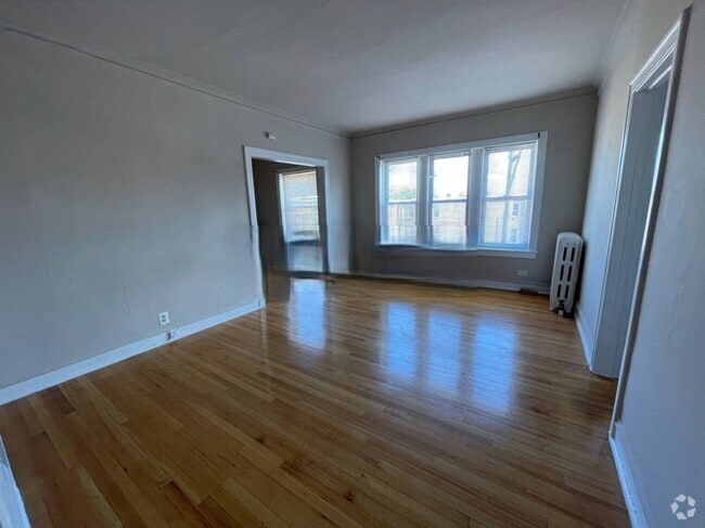 Building Photo - 1319 W Estes Ave Unit A05C Rental