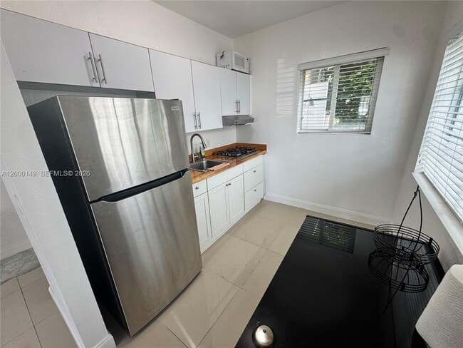 Photo - 8415 Harding Ave Unit 9