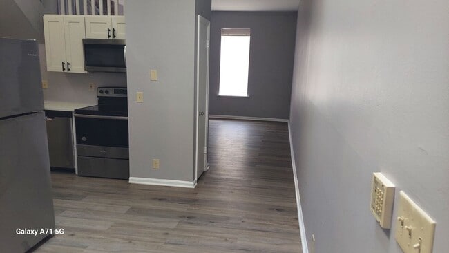 Building Photo - Menard Apartments Unit 2355 A