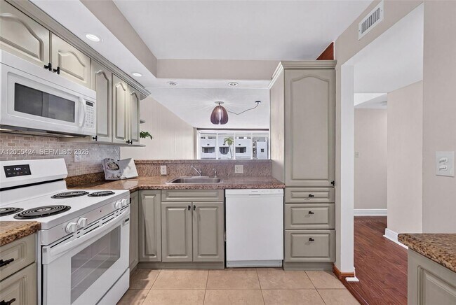 Photo - 8233 Harding Ave Unit 208