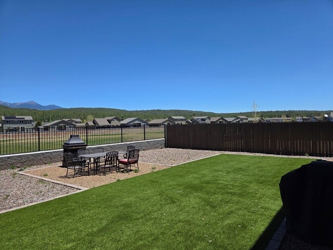 Photo - Coming in June!       Spacious 4 Bedroom Home in Bellemont | Fenced Backyard + 2 Car Garage