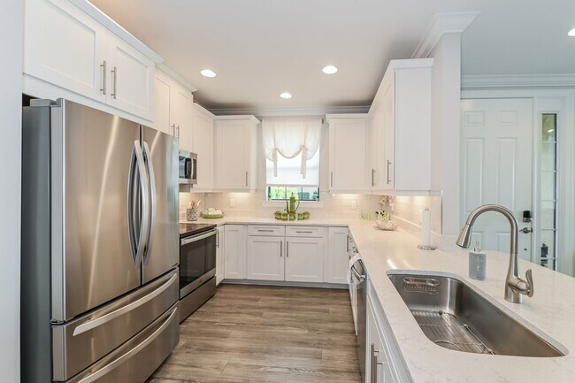 Photo - Luxury Furnished Coach Home in Esplanade Golf & Country Club – 2+Den / 2.5 Bath