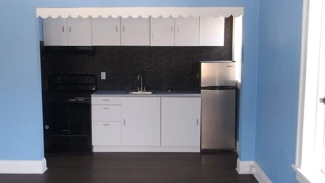 Cocina de estudio - The Apartments at Liberty Rose