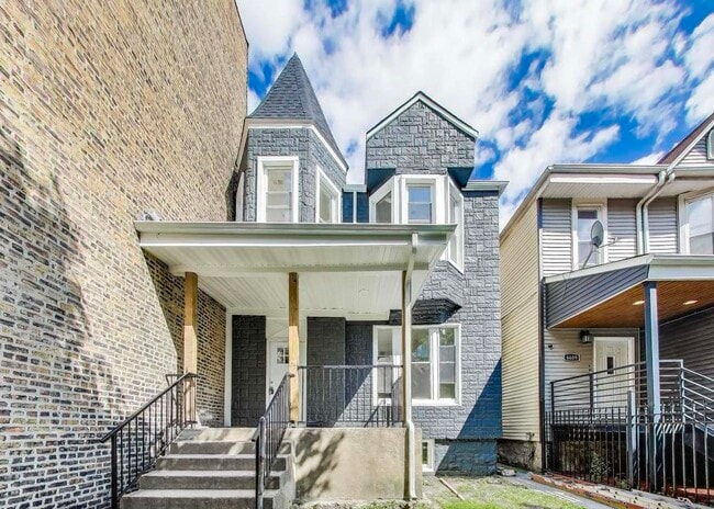 Building Photo - 6605 S Maryland Ave Unit 2
