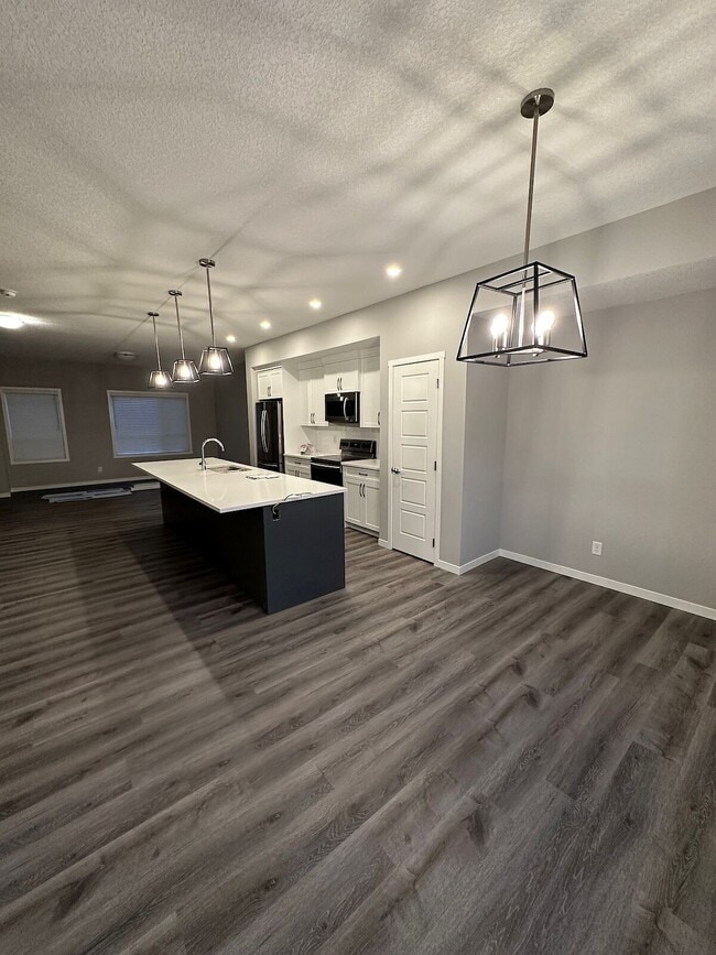 Photo - Stylish 3-Bedroom Townhouse in Harvest Hills – Perfect for Family Living (IP009)