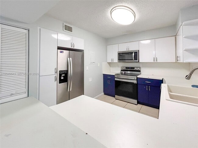 Building Photo - 14971 SW 82nd Ln Unit 20-308