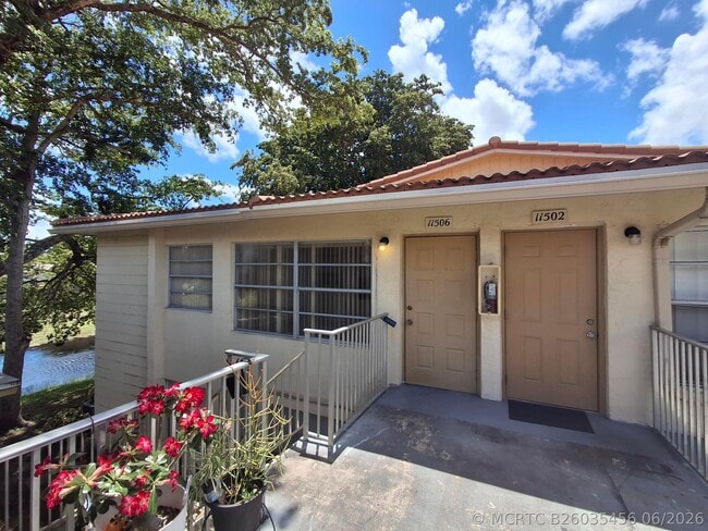 Building Photo - 11506 Royal Palm Blvd Unit 11506