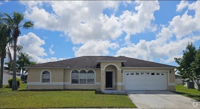 Building Photo - NICE!   LARGE 4 BEDROOM / 2 BATH / 2 CAR G... Rental