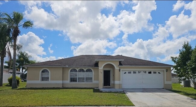 Building Photo - NICE!   LARGE 4 BEDROOM / 2 BATH / 2 CAR G... Rental