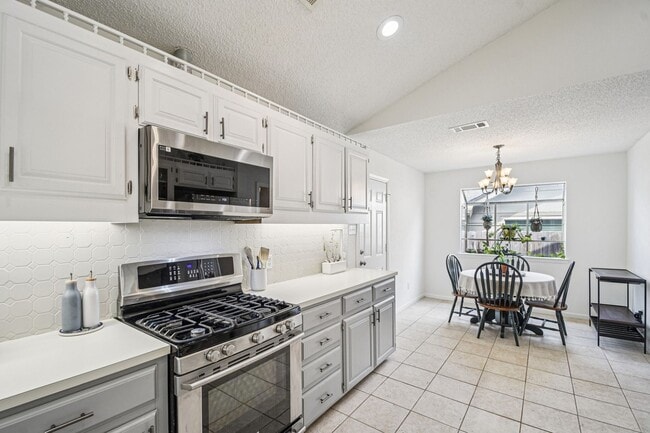 Photo - Hill Country Charm Meets City Convenience / 3 miles to Domain / One story / Covered Patio / Refri...