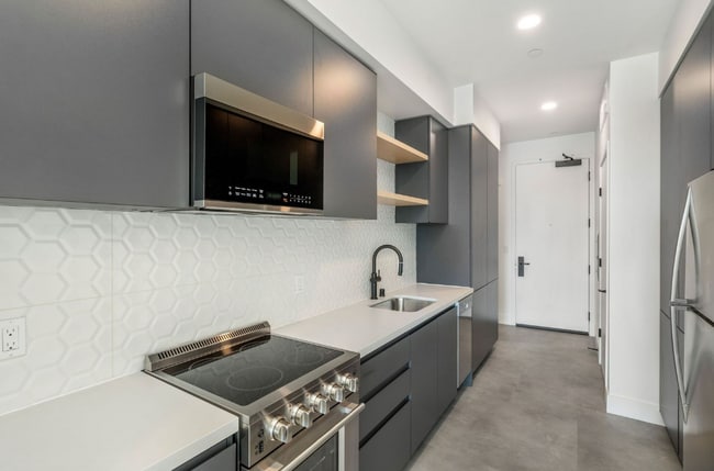 Building Photo - 3450 W 43rd St Unit 207 Rental