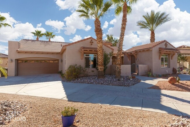 Building Photo - Beautiful home located in the gated commun...
