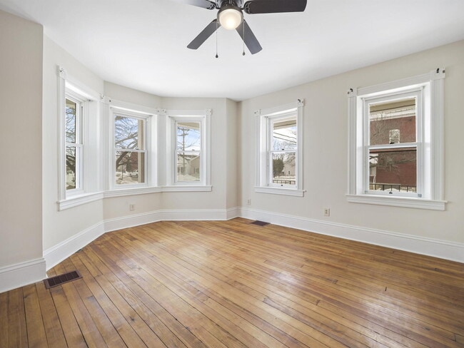 Photo - Charming 3-Bedroom Single-Family Home with Wrap-Around Porch & Private Fenced Yard