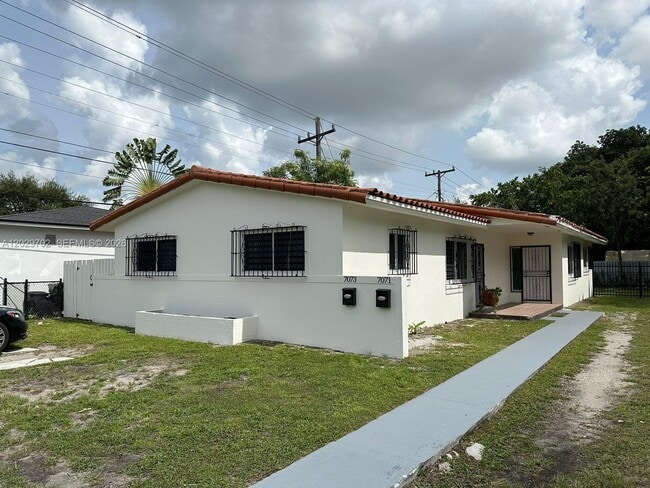 Building Photo - 7073 SW 4th St Unit 1