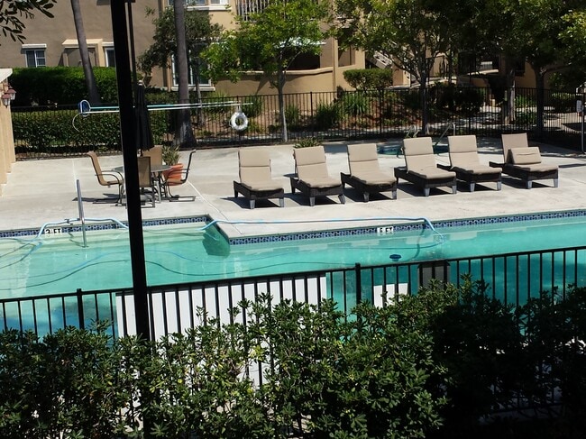 Beautifully upgraded with 2 master bedrooms, fireplace, covered parking, close to I-5 and I-805. - 7319 Calle Cristobal Condo Unit Canyon Park Villas