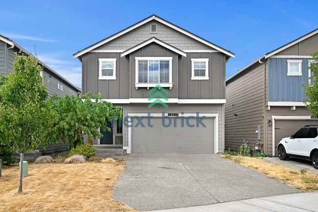 Building Photo - "Charming 4-Bedroom Home in Puyallup with Spacious 1831 Sq Ft Layout & 2.5 Baths!"