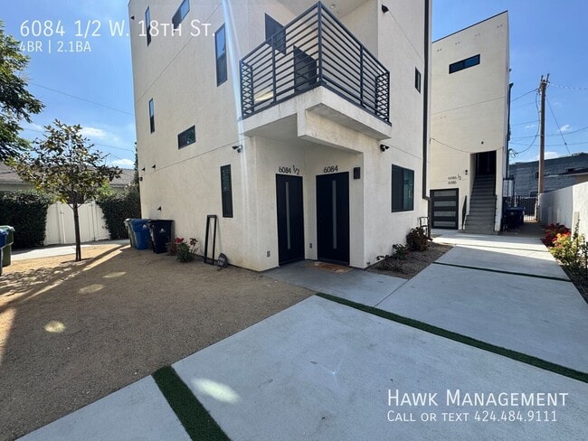 6084 1/2 W. 18th St.-