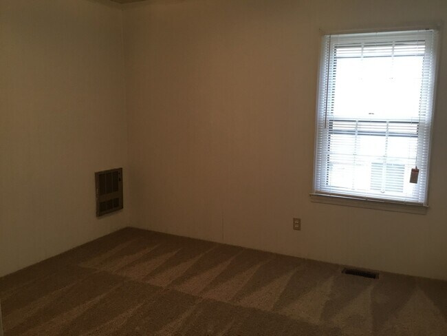 Photo - Charming 2-Bedroom Home with Spacious Livi...