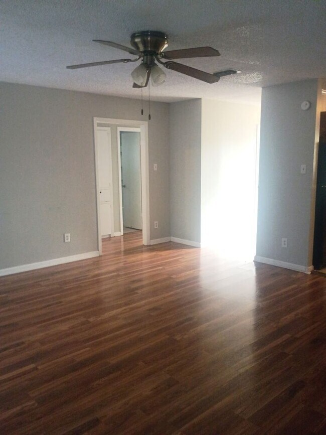 Photo - Updated 3/2 Home with 2-Car Garage + Air-Conditioned Workshop!