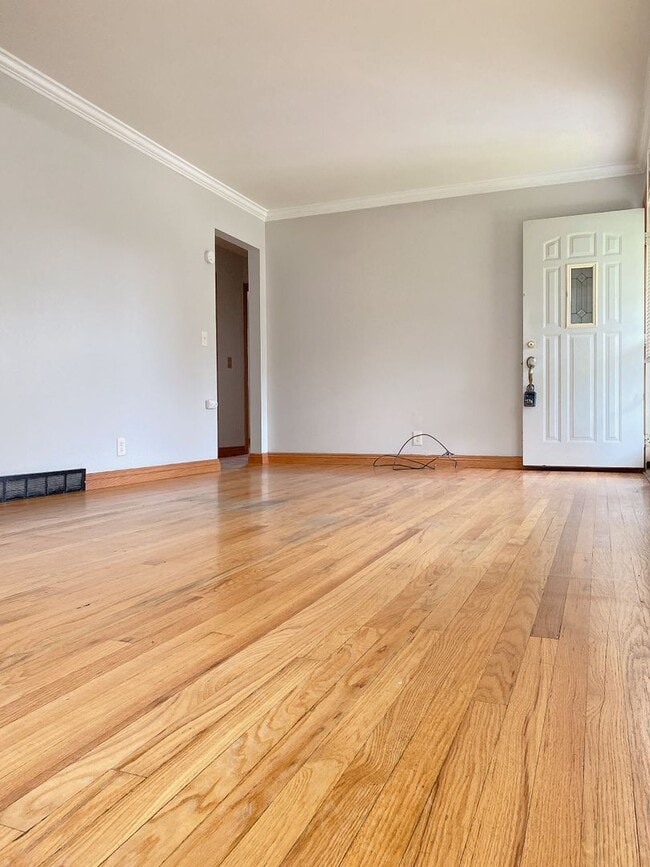 Photo - Beautiful 3 bed 1 bath house, over sized driveway, garage and fenced in back yard $1,795