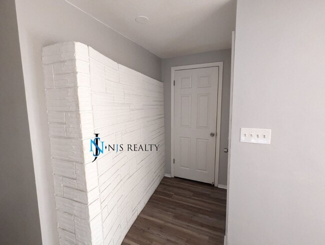 Photo - 2/2/1 with  RENOVATED baths & kitchen, fenced yard, NEW lvp flooring and a OVERSIZED lanai!