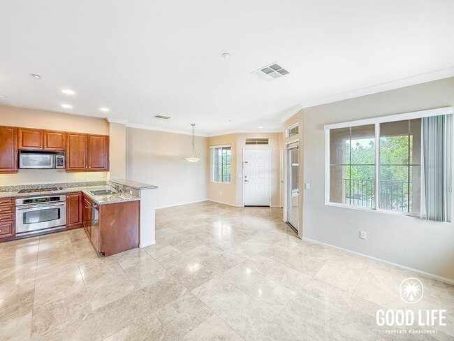 Photo - Bright 2BD/2BA Condo in Sabre Springs with Covered Balcony, In-Unit Laundry & Garage Unit 328