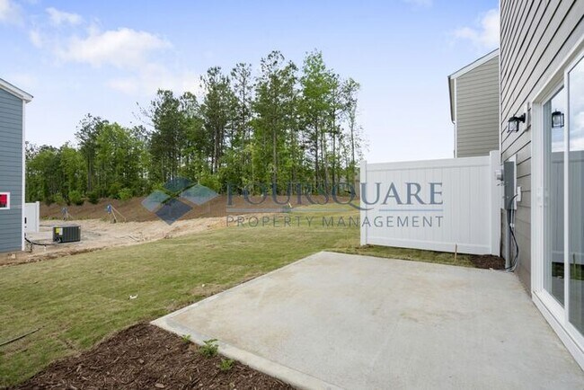 Photo - End-Unit Townhome with Loft, Open Floor Plan & Patio, Conveniently Located Near Dining, Shopping,...