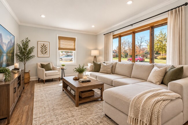 This beautifully staged living room offers a warm and inviting space designed.