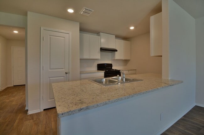 Photo - 2 Weeks Free Move-In Special! Charming Single-Story in Redbird Ranch | Open Layout, Private Suite...