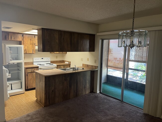 Building Photo - 5030 E Linebaugh Ave Unit D