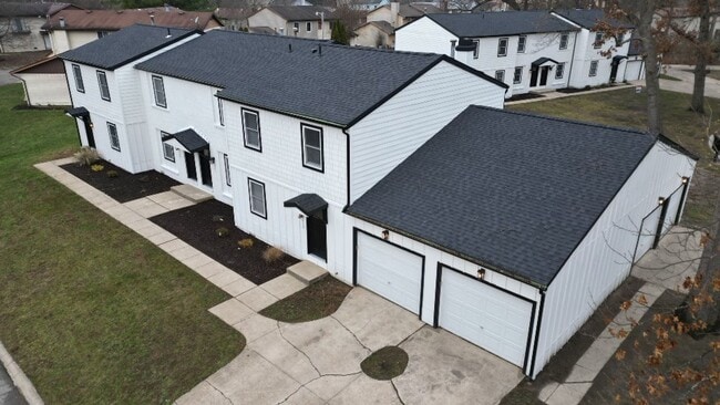 Building Photo - Renovated 2-Bedroom, 1.5-Bathroom Condo in South Bend – $1,435/Month – Accepting Section 8 (Lawn ...