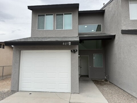 Building Photo - 3 bed 2 bath with garage $1,400 Rent Unit A