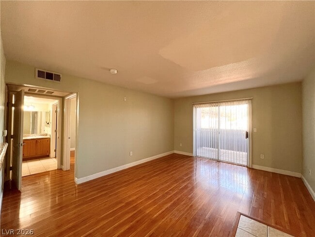 Building Photo - 5055 W Hacienda Ave Unit 1202