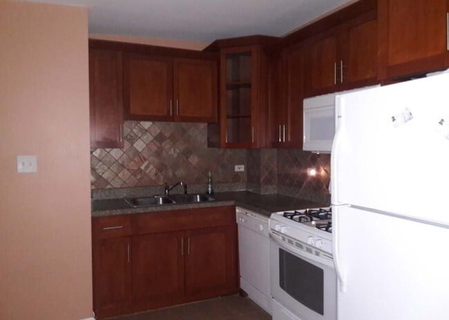 Building Photo - 5118 S Cicero Ave Unit 3NE