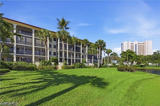 Building Photo - 6080 Pelican Bay Blvd Unit 104A