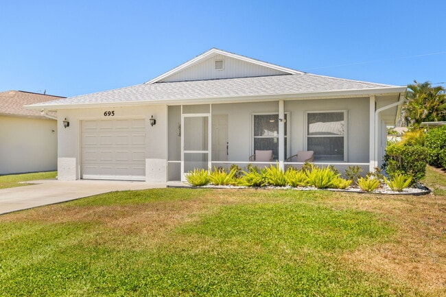 Front Exterior - 695 104th Ave N